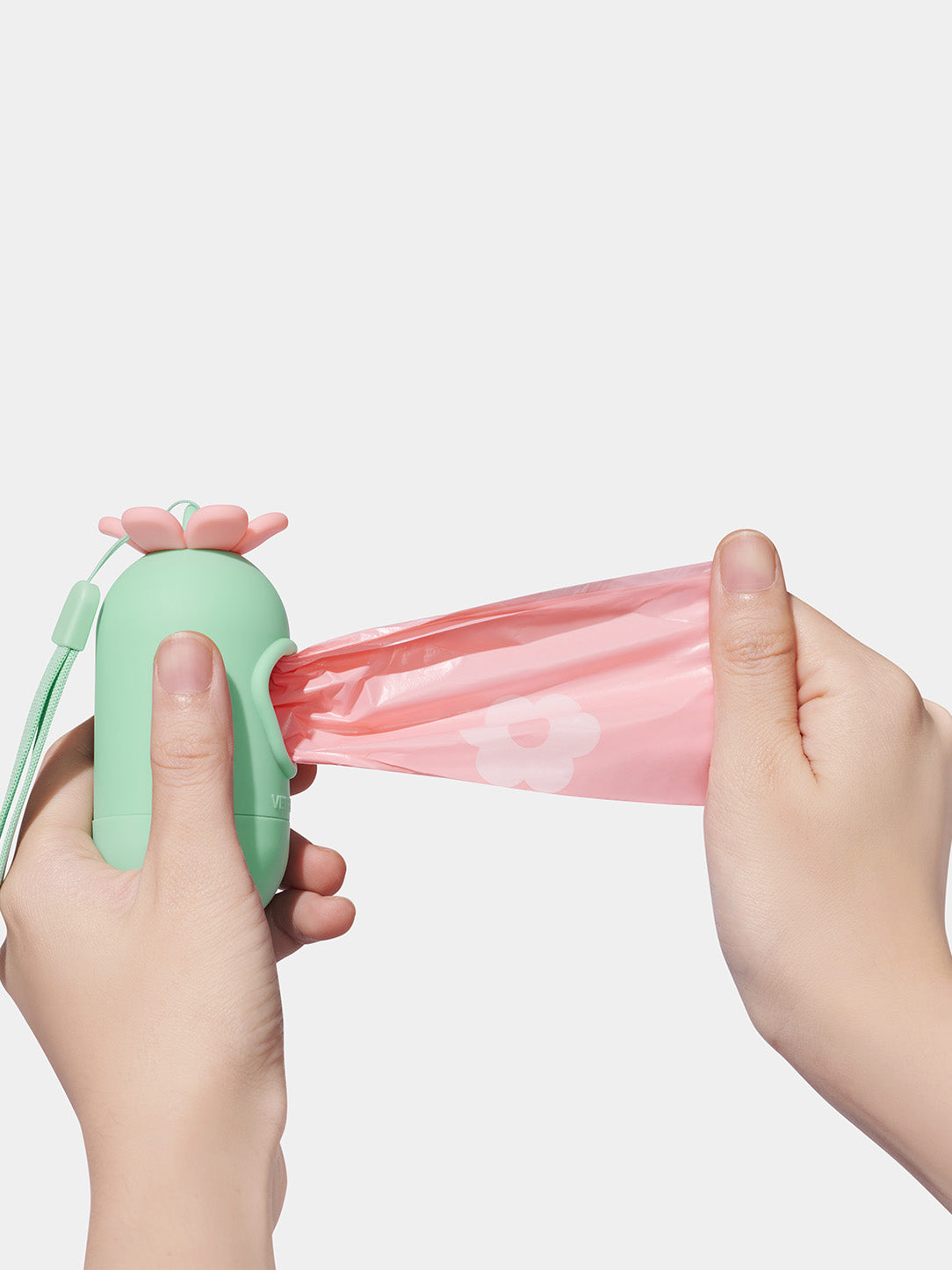 Dispensador Floral Rosado de bolsas para desechos de mascotas VETRESKA